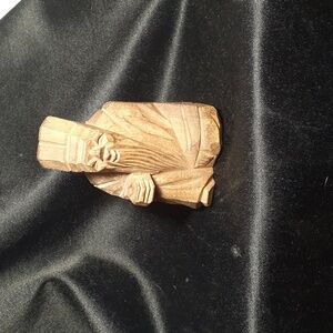 Vtg handcarved wooden sculpture. Seated man in robes and headwear. Rare.